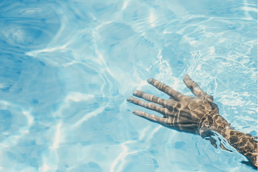 man in chlorine swimming pool